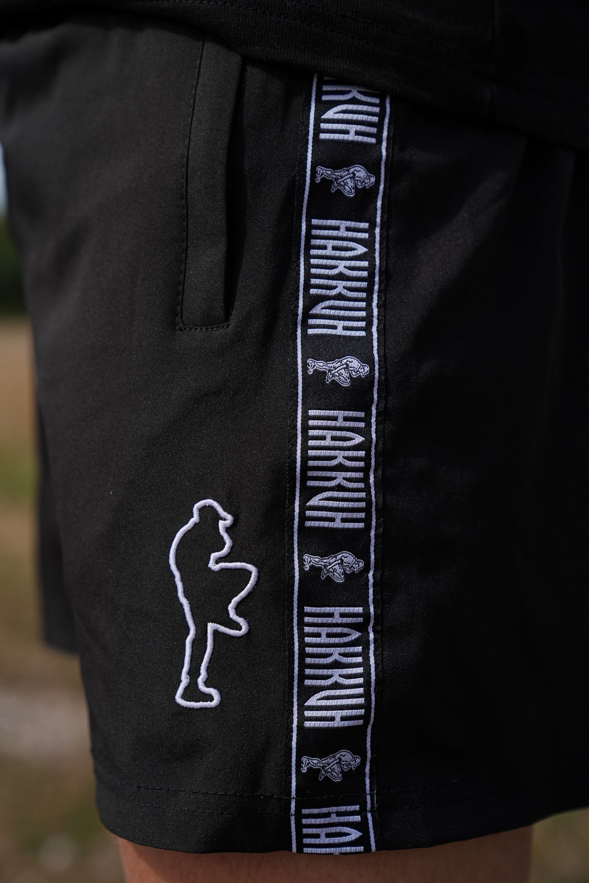 HAKKUH OUTLINE SWIM SHORTS