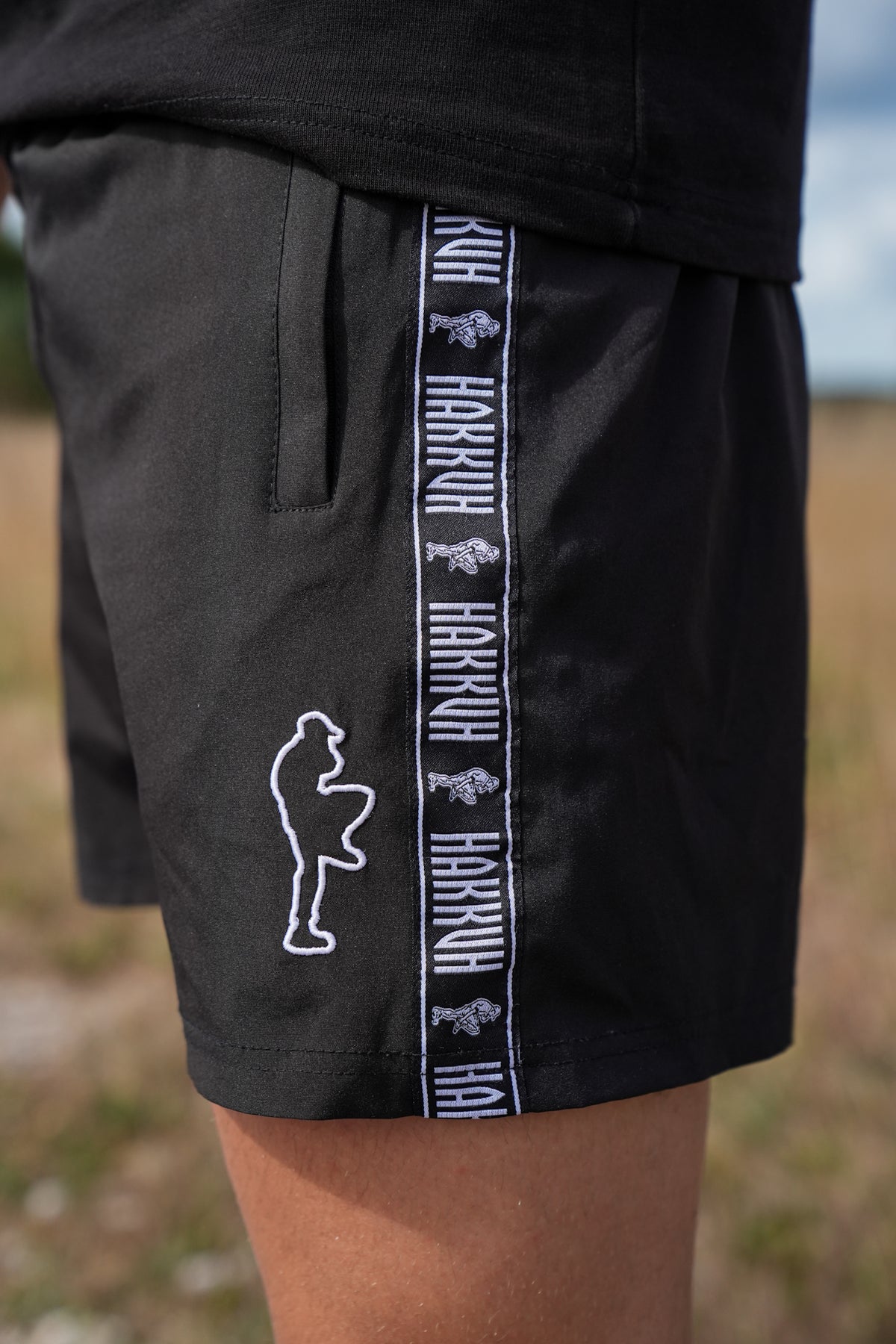 HAKKUH OUTLINE SWIM SHORTS