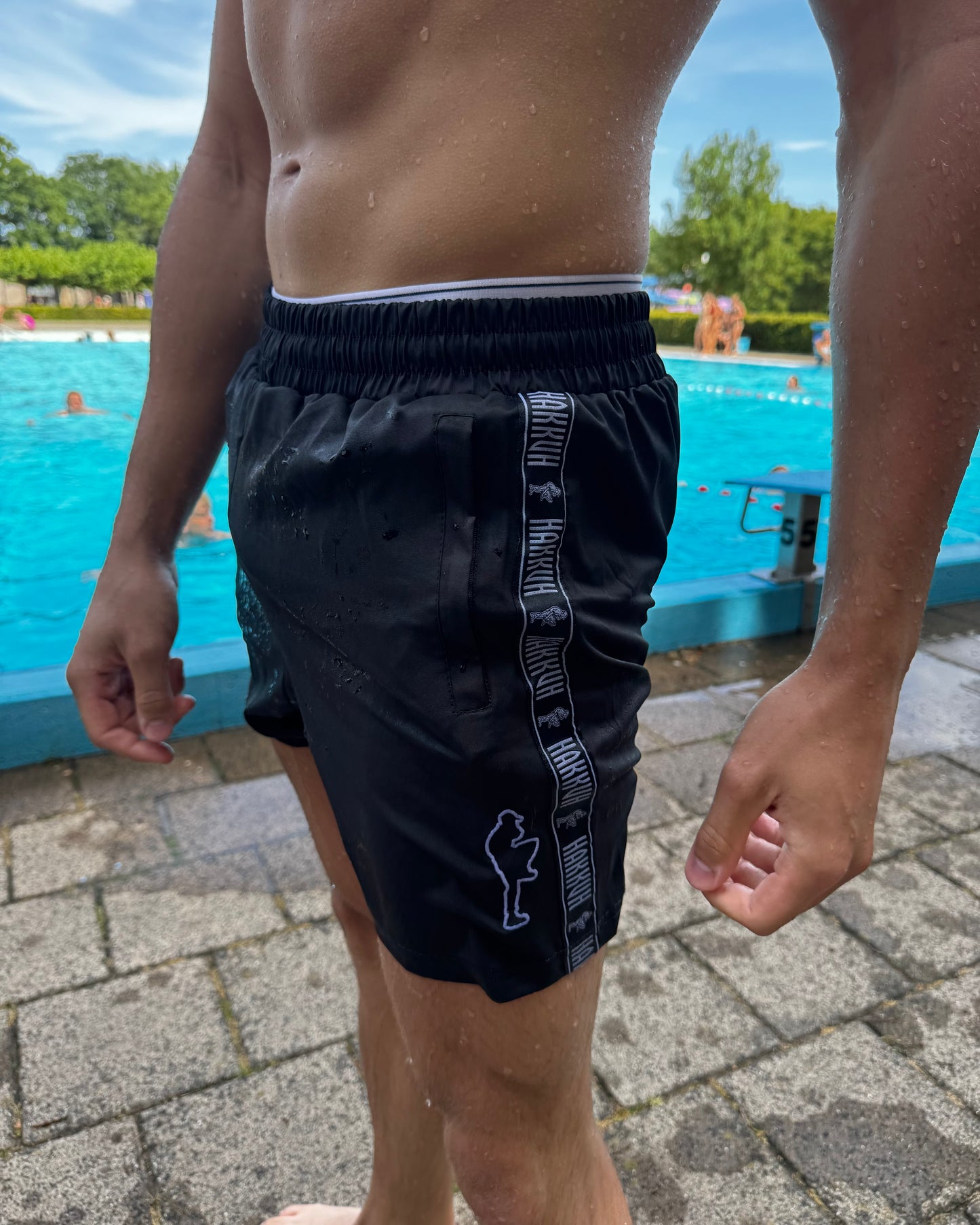 HAKKUH OUTLINE SWIM SHORTS